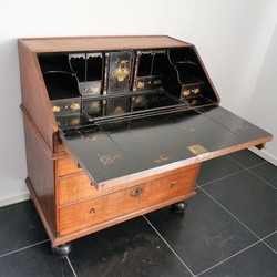 English Bureau With A Black Lacquered Interior 18th century in oak, England