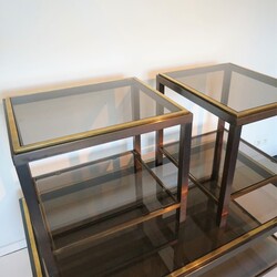 Set: Coffee And Side Tables In The Style Of Willy Rizzo Hollywood regency in brass and bronzed metal and smoked glass, French - Italian 1980